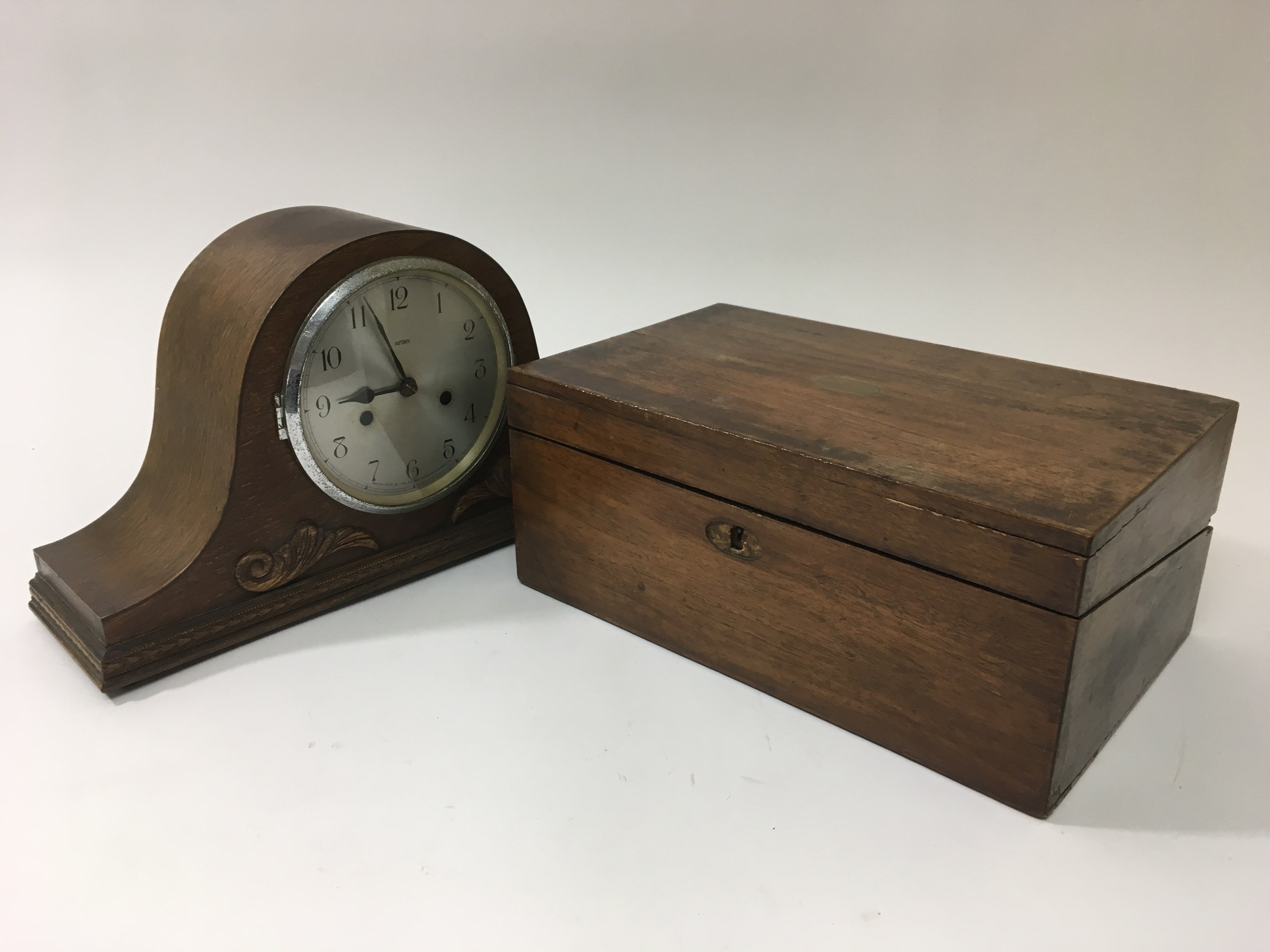 A walnut writing slope and an oak clock (2).