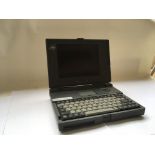 A Dual group laptop presumably from 1991 with an I
