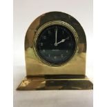 An unusual Jaeger car clock in a brass case (worki