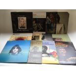 Twelve LPs by various artists including Donovan, M