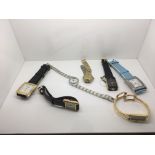A bagged collection of watches including Gucci, Ci