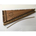 A zither and an usual woodwind instrument (2).