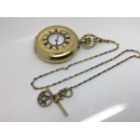 An 18ct gold pocket watch and chain. Weight approx