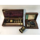 A wooden cased Sikes hydrometer, an old Medicoil b