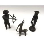 Three old metal oriental or African figures