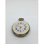 A lady's 18k gold button wind pocket watch with en