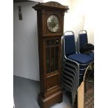 An oak longcase clock, approx 181cm.