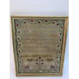 A framed child's sampler