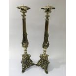 A pair of large decorative brass candlesticks, app