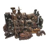 An extensive collection of carved hardwood figures