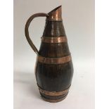 A copper bound arts and crafts jug.