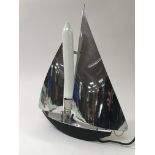 A chrome lamp in the form of a sailing boat, appro