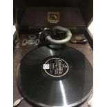 An oak H M V case table top gramophone , with reco