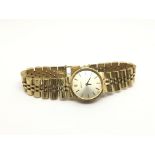 Withdrawn -A ladies petite Rolex watch with baton numerals on