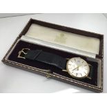 An Omega Geneva wristwatch with baton numerals and