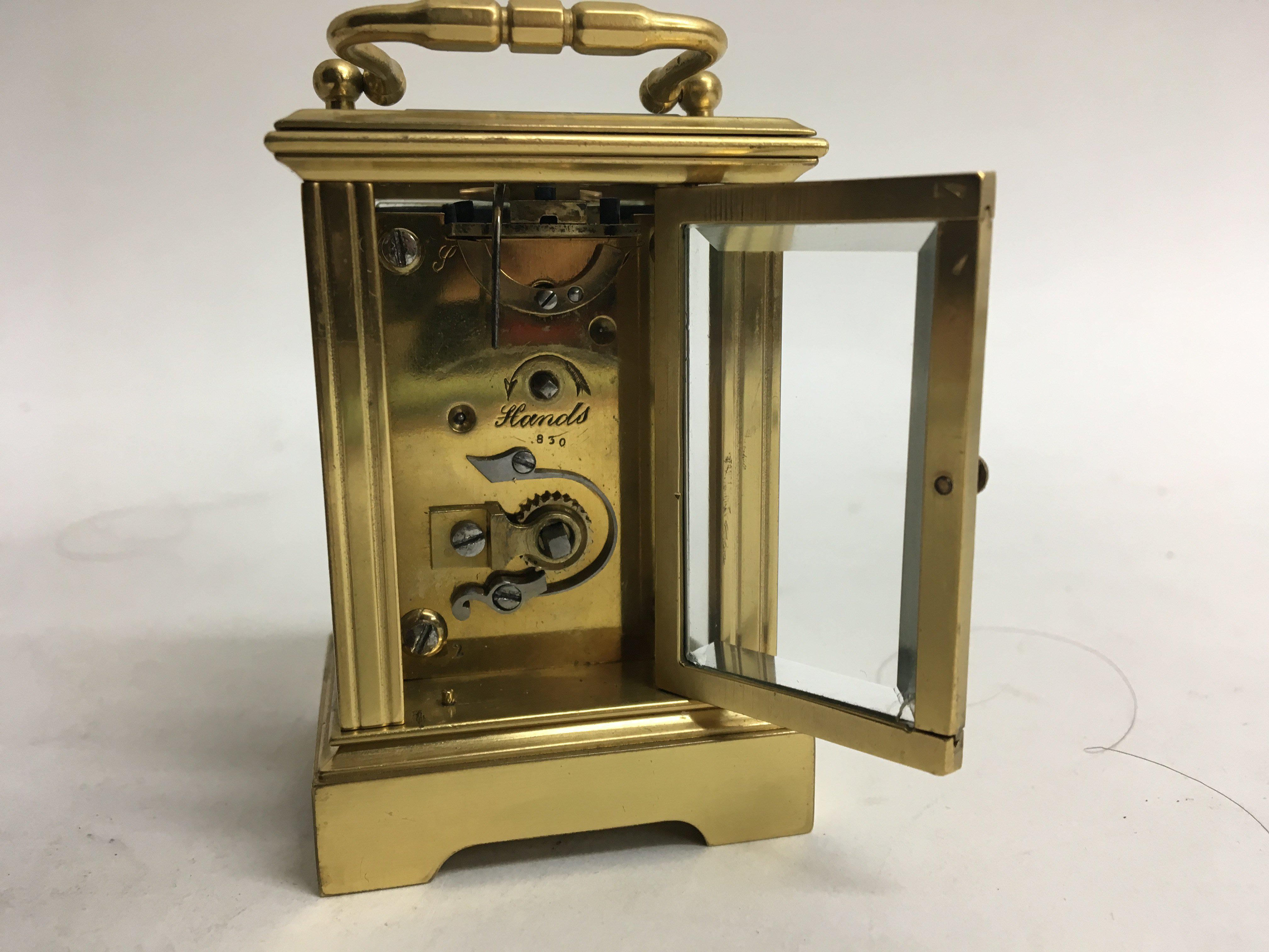 A miniature brass carriage clock. - Image 4 of 4