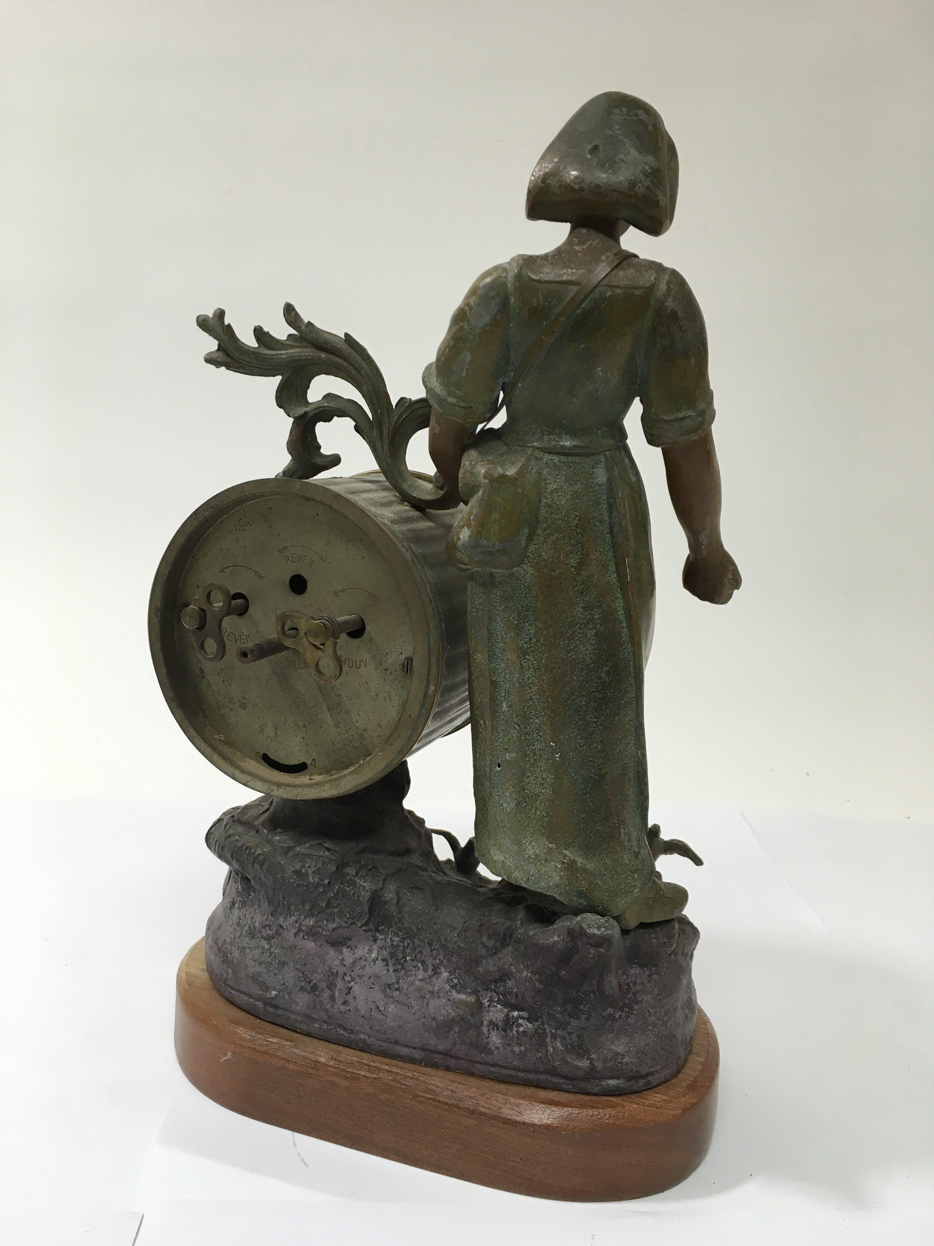 A spelter figural clock of a woman feeding birds, - Image 2 of 2