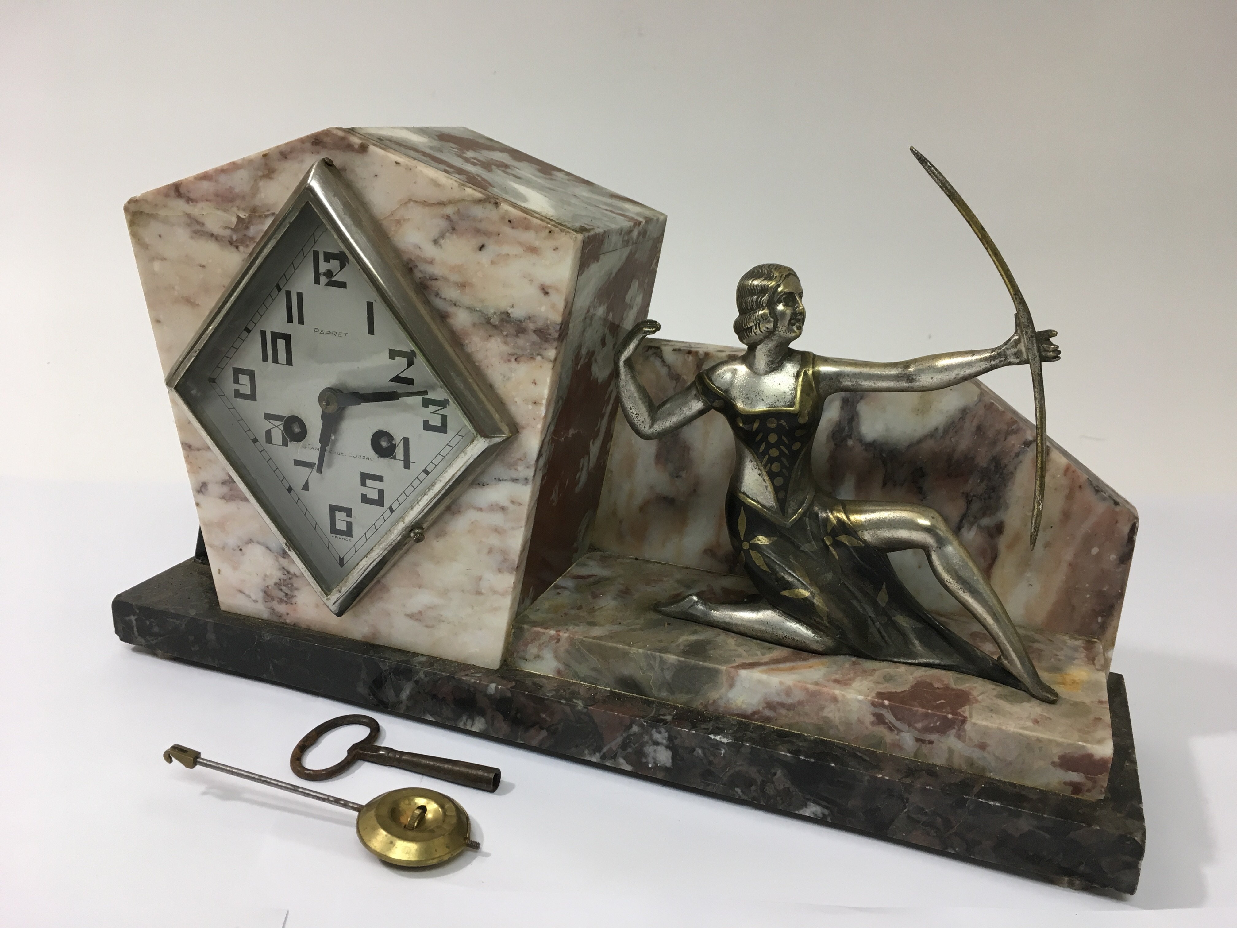 An Art Deco eight day marble mantle clock decorate