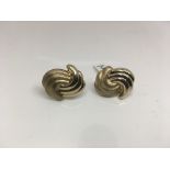 A 9ct pair of unusual two tone stud earrings with Continental fittings. Weight approx 6.09g