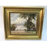 A small, 19th century gilt framed oil on panel landscape painting by Owen Waters, (1916-2004),