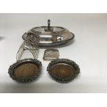 A silver toast rack a silver cigarette case ,pair of coasters and a silver plated tureen
