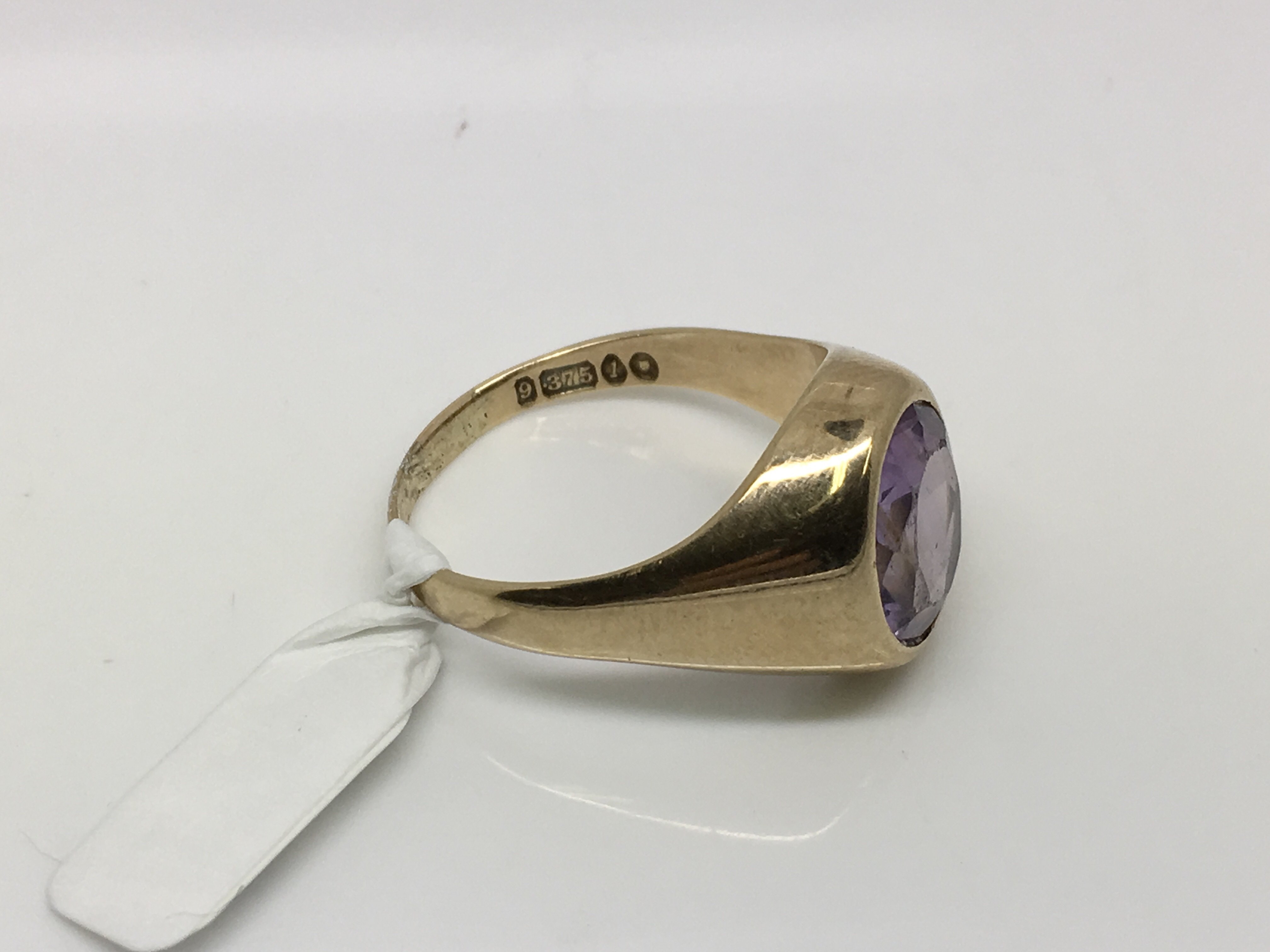 A 9ct gold oval amethyst ring, approx size R-S and approx 6.6g. - Image 2 of 2