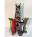 A collection of coloured glass vases including a m