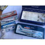 A boxed diecast British Airways Concorde together with other planes including United States of