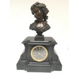 A marble mantle clock with mounted bronze bust mec