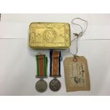 A Queen Mary tin from Christmas 1914 with the cigarettes and card still inside together with a WW1