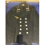 A framed a glazed German u-boat petty officers jacket