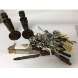 A collection of stoneware bottles, a box of treen and cutlery.