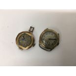 Two gold ladies watches.