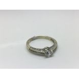 A 9ct gold ring set with CZ stones ring size O.