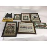 A collection of reproduction advertising signs