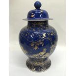 A 19th Century Chinese bulbous vase and cover with