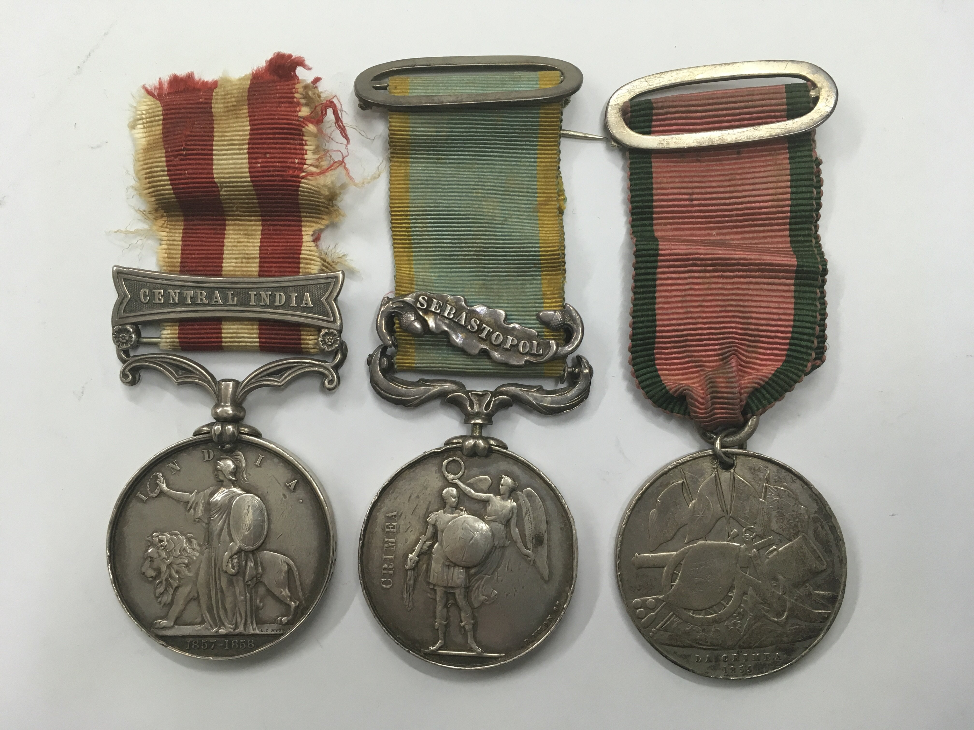 A group of 3 Victorian War medals. An Indian mutiny medal with 'Central India' bar awarded to