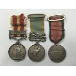 A group of 3 Victorian War medals. An Indian mutiny medal with 'Central India' bar awarded to