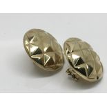 A pair of continental design 9ct gold button design earrings weight 7g approximately.