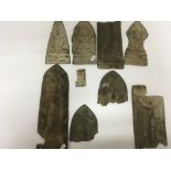 A collection of metal plaques depicting Buddha (6)