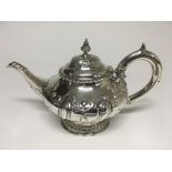 A silver tea pot by William Hewitt, London 1837 , 693 grams ap