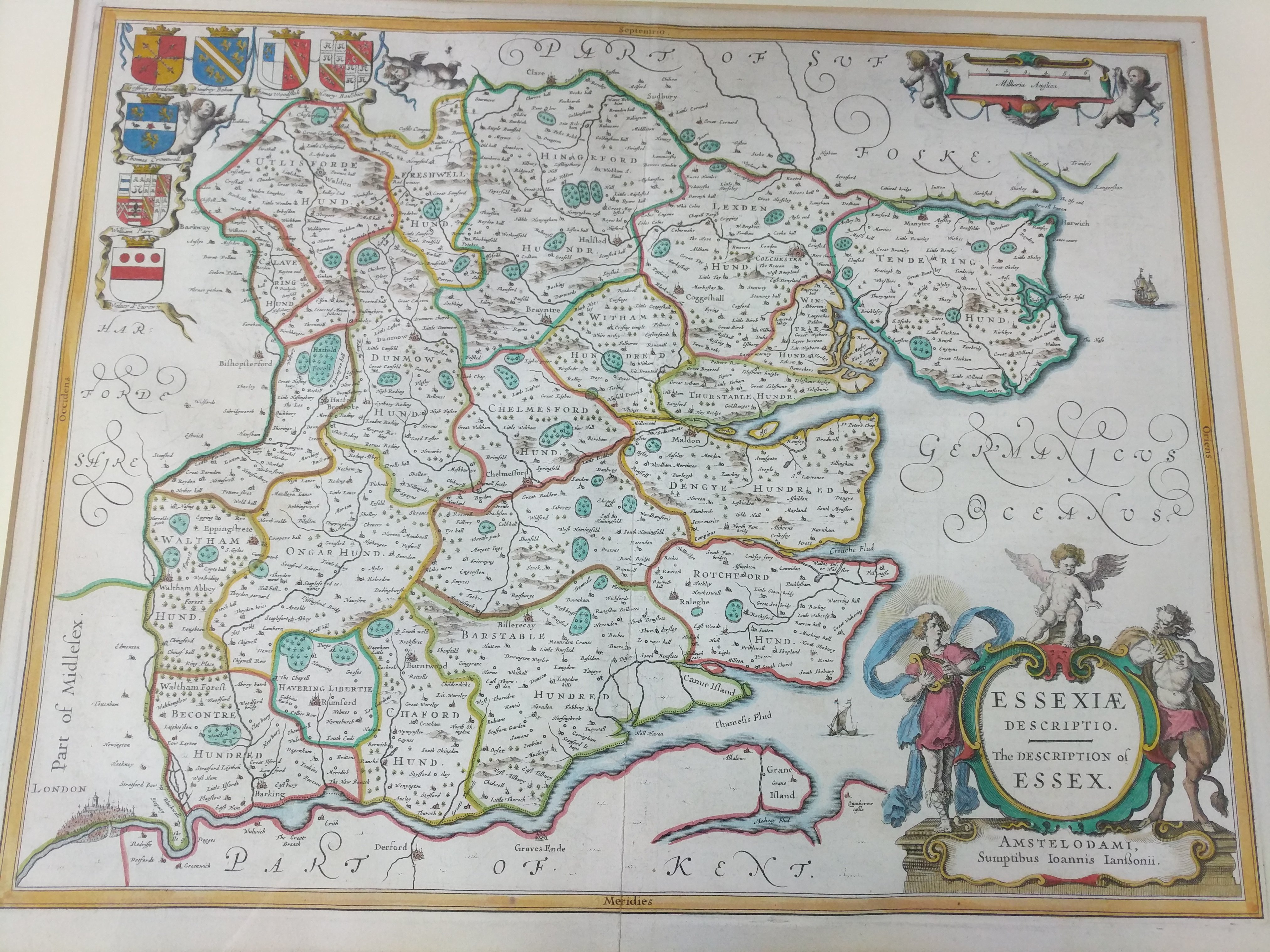 A framed map of Essex titled "Essex Description" from the late 17th or 18th century.