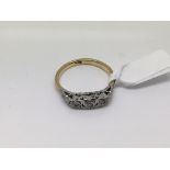 An 18ct gold three stone diamond ring, approx size O and approx 3g.