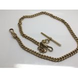 An 18ct Gold watch chain each link stamped 18, with an attached bar 56g approx.