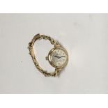 A 9 ct gold Rotary ladies wrist watch with 9 ct gold strap