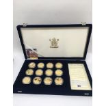 A cased Royal Mint British military set of nickel and gold plated coins.