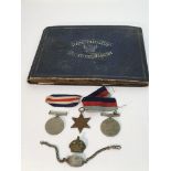 A WW2 medal group, I.D. bracelet, and a cap badge