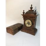 A Continental walnut eight day mantle clock and a