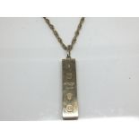 A 9ct Gold ingot pendent with attached 9ct gold chain (2) weight 44g approximately,
