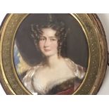 A Quality Early 19th Century hand painted portrait miniature of a lady and one other conforming of a